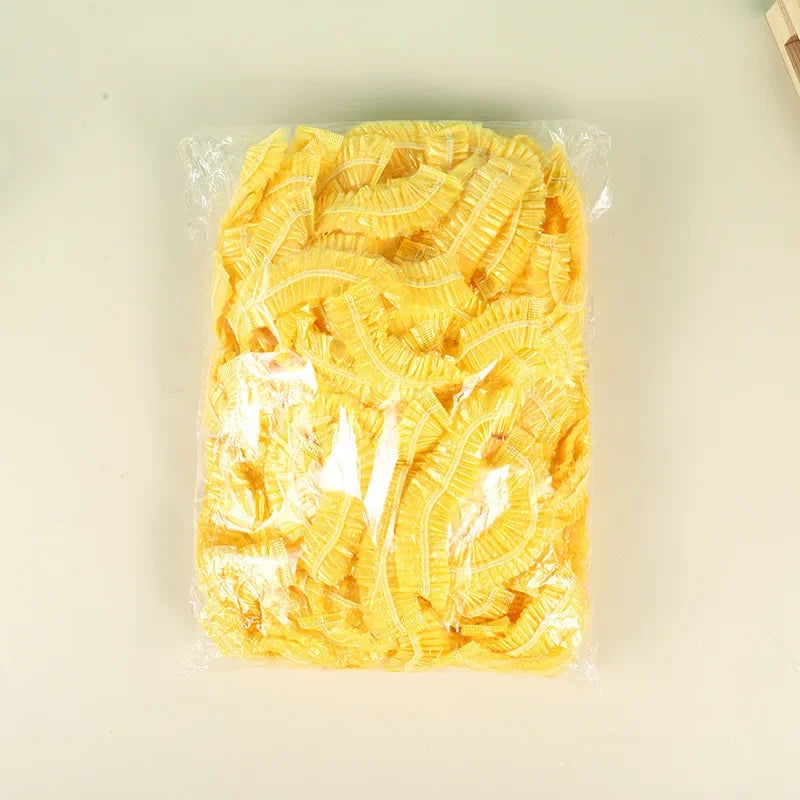 bonnet de douche jaune