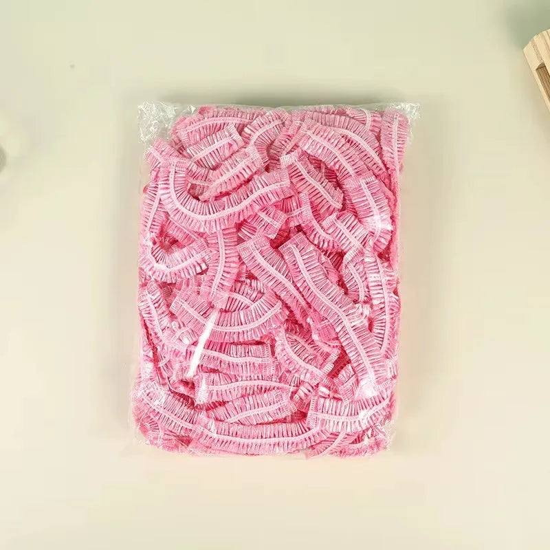 bonnet de douche rose